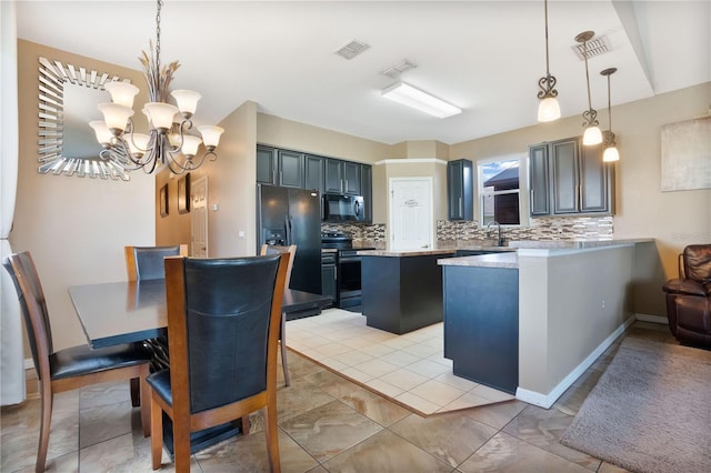 kitchen with electric stove, hanging light fixtures, a kitchen island, decorative backsplash, and black fridge