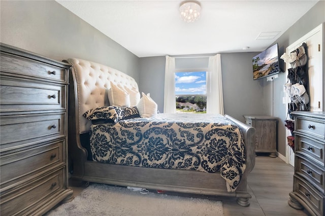 bedroom with light hardwood / wood-style flooring