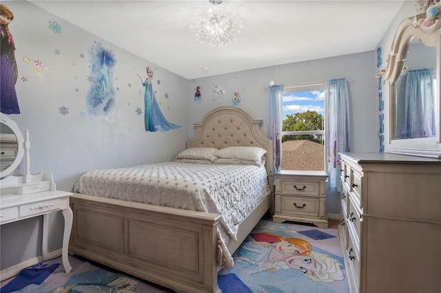 bedroom featuring a chandelier