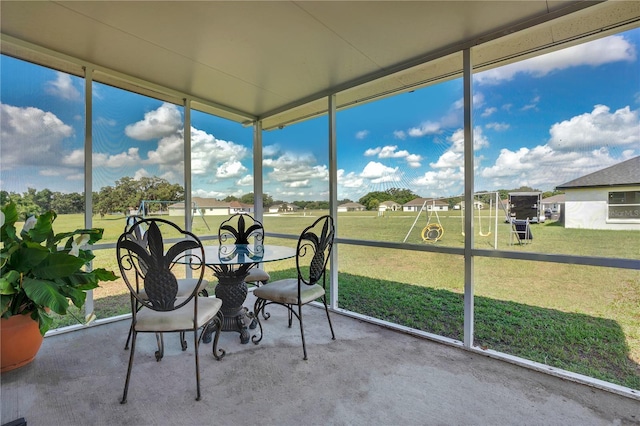 sunroom featuring a wealth of natural light