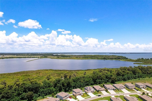 drone / aerial view with a water view