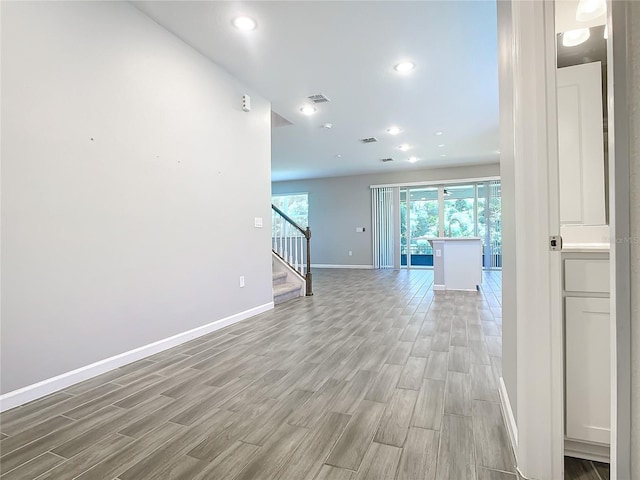 hallway featuring wood-type flooring