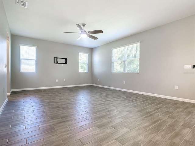 unfurnished room featuring ceiling fan