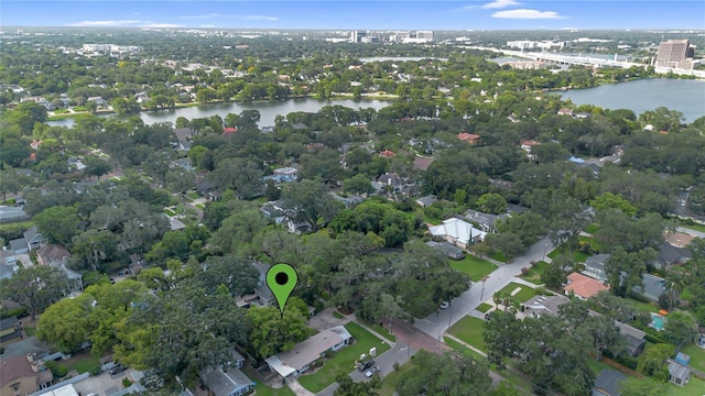 drone / aerial view with a water view and a residential view