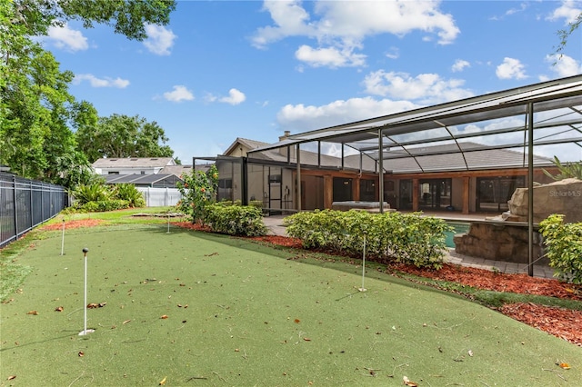 view of yard with a lanai