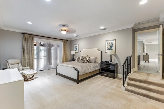 carpeted bedroom with ceiling fan and ornamental molding