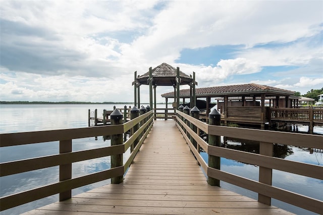 view of dock with a water view