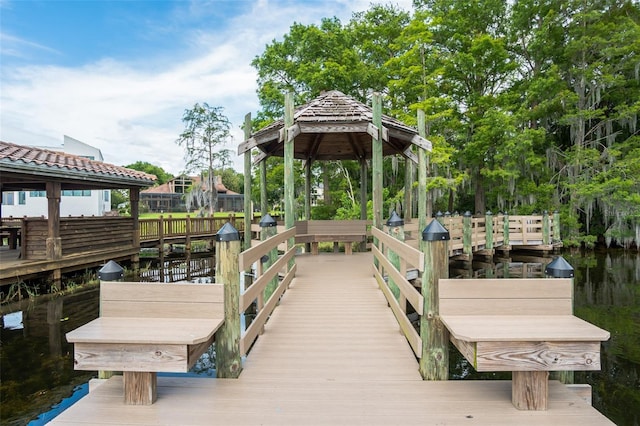 dock area featuring a water view and a gazebo