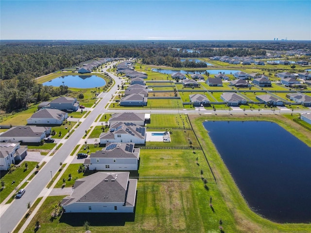 bird's eye view with a water view