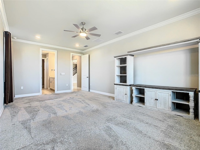 unfurnished bedroom with ceiling fan, light colored carpet, ornamental molding, and connected bathroom