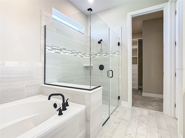 bathroom with independent shower and bath