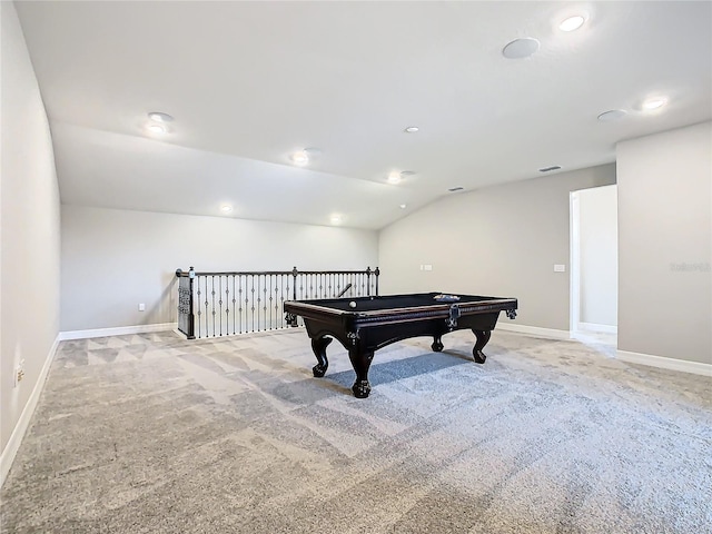 recreation room with billiards, vaulted ceiling, and light colored carpet