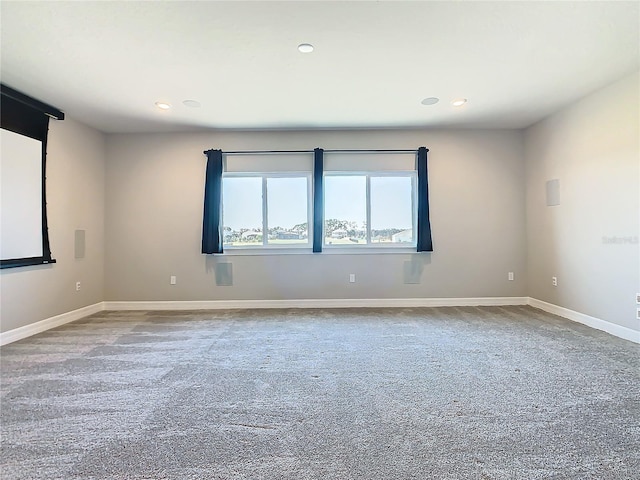 unfurnished room with carpet floors