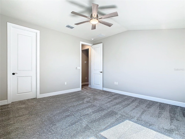 unfurnished bedroom with carpet floors, vaulted ceiling, and ceiling fan