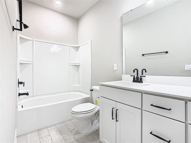 full bathroom with vanity, shower / bathtub combination, and toilet