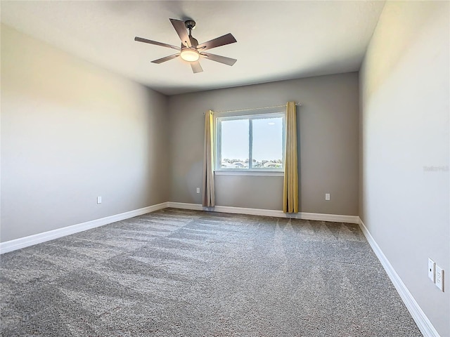 unfurnished room featuring carpet floors and ceiling fan