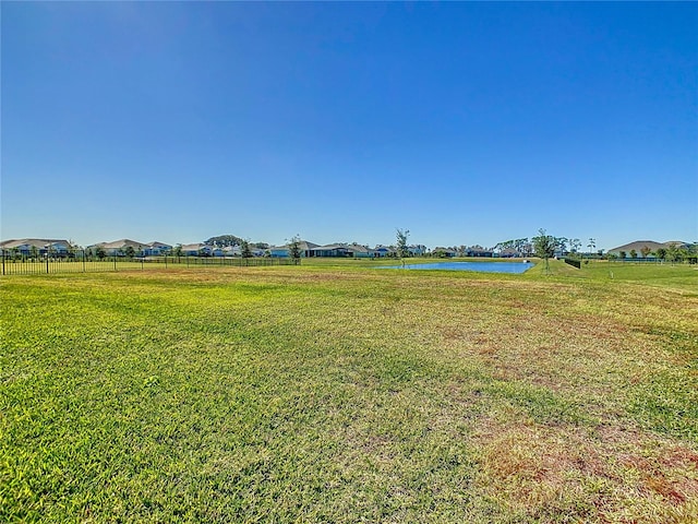 view of yard featuring a water view