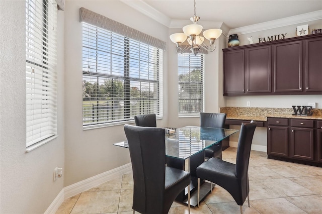 dining room featuring a notable chandelier, ornamental molding, and light tile patterned flooring