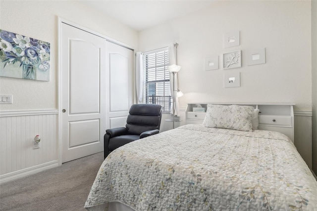 bedroom featuring a closet and carpet