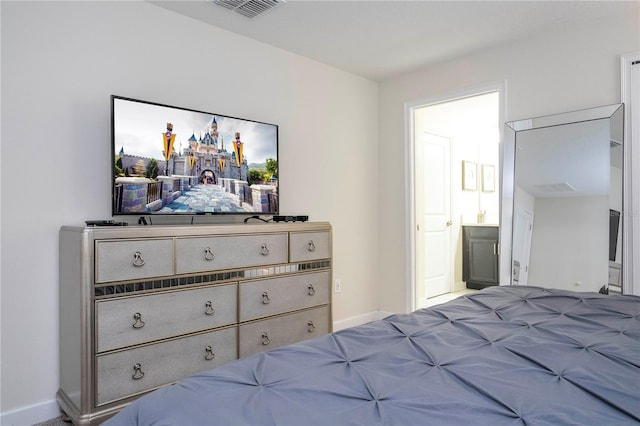 bedroom with ensuite bath