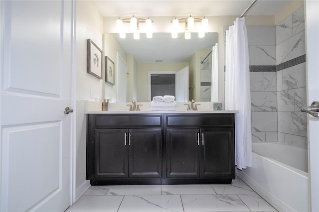 bathroom featuring vanity and shower / bath combo with shower curtain