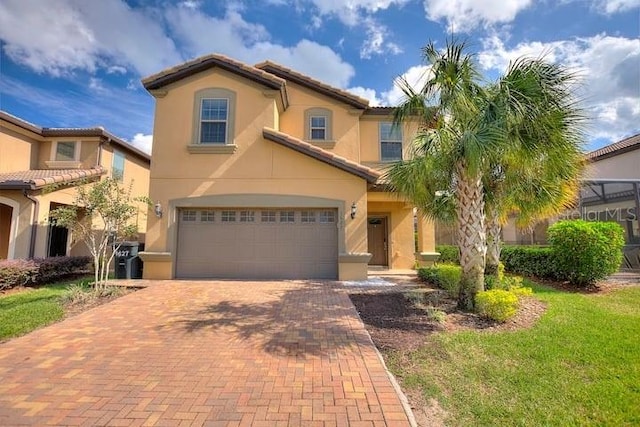 mediterranean / spanish-style home featuring a garage