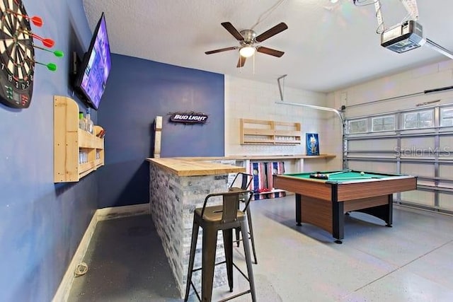 game room featuring concrete floors, pool table, and ceiling fan