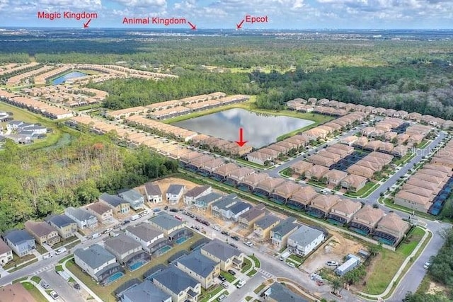 birds eye view of property featuring a water view