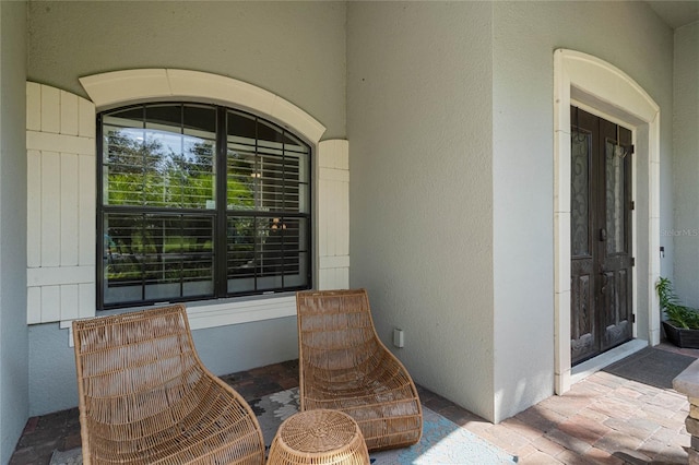 entrance to property featuring french doors