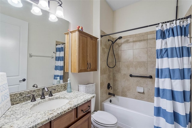 full bathroom featuring vanity, toilet, and shower / tub combo