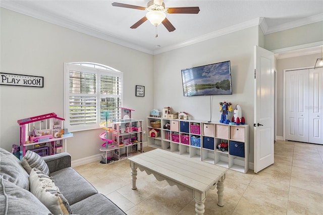 playroom with crown molding, light tile patterned flooring, and ceiling fan