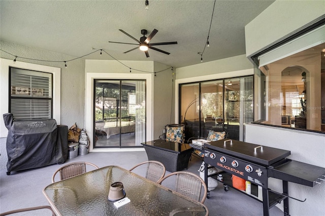 view of patio featuring grilling area and ceiling fan