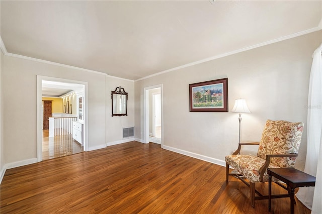 unfurnished room with wood-type flooring and crown molding