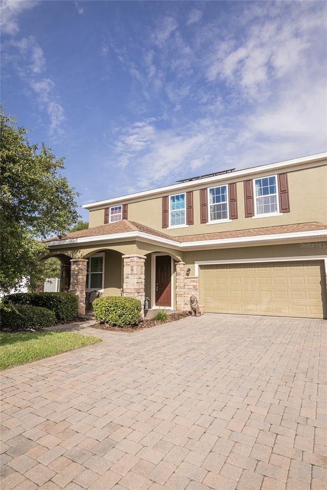 view of front of home featuring a garage