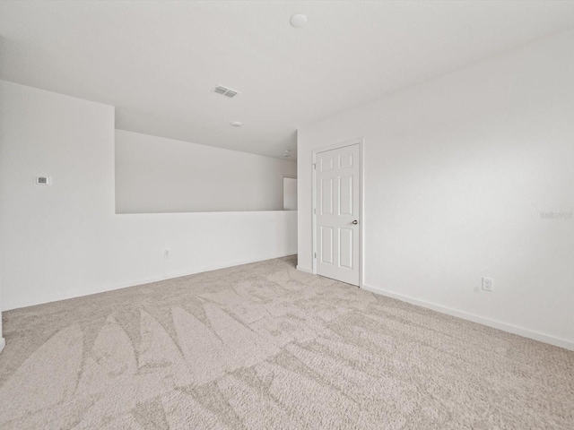 spare room with carpet floors