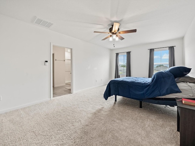 bedroom with light colored carpet and ceiling fan