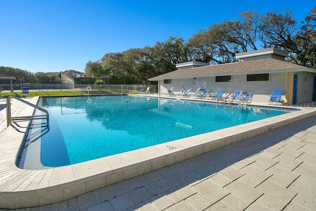 view of swimming pool with a patio