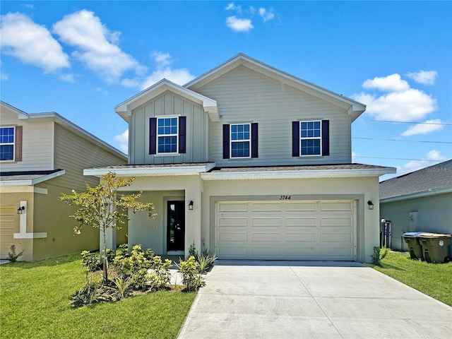 7424 Bent Tree Loop, Saint Cloud, FL 34771 - view of front of property featuring a front lawn and a garage