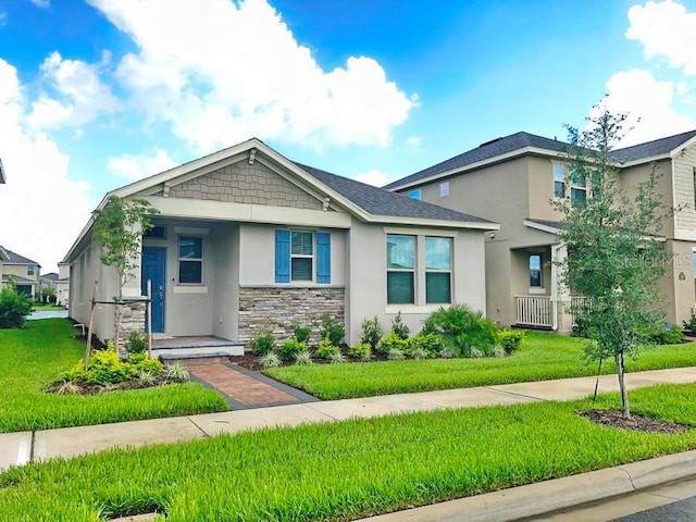 view of front facade with a front lawn