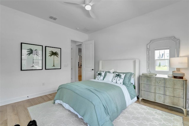 bedroom featuring hardwood / wood-style flooring and ceiling fan