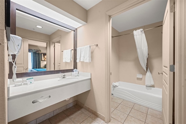 bathroom featuring shower / bathtub combination with curtain, tile flooring, and sink