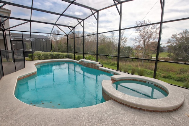 view of swimming pool with an in ground hot tub and glass enclosure