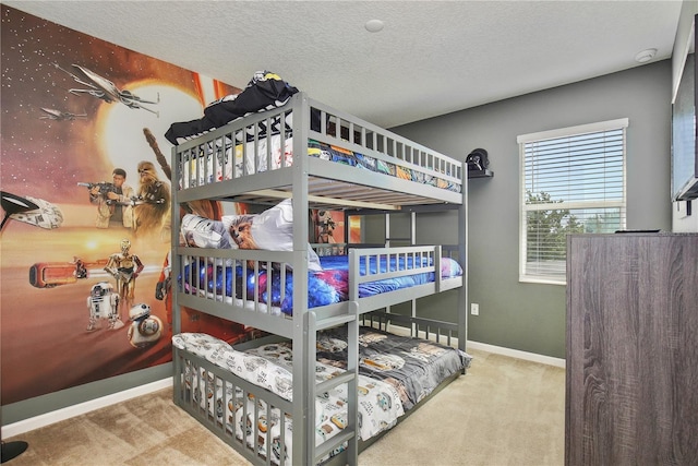 carpeted bedroom with a textured ceiling