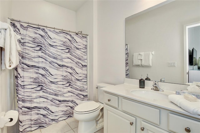 bathroom with tile patterned flooring, vanity, toilet, and a shower with shower curtain