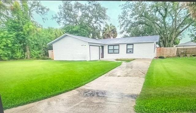 ranch-style house with a front lawn