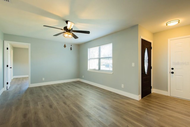 4230 Ponds Dr, Cocoa, FL 32927 - entryway with ceiling fan, baseboards, and wood finished floors