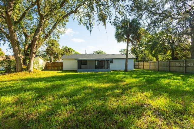 4230 Ponds Dr, Cocoa, FL 32927 - back of property featuring a sunroom