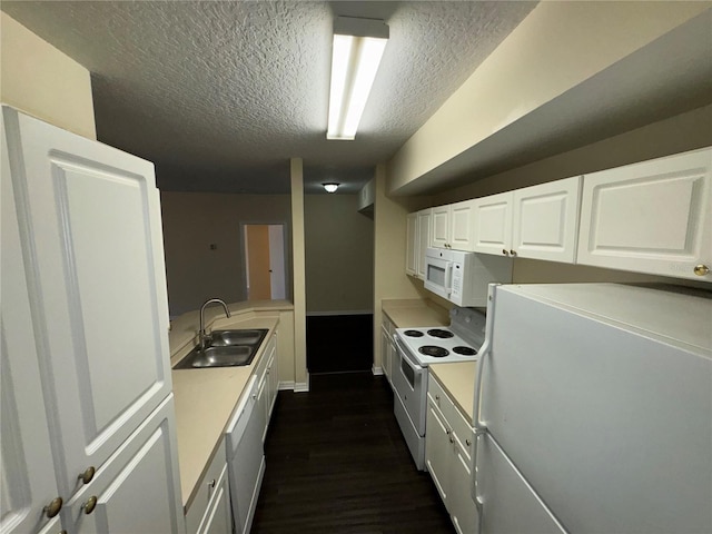 kitchen with a textured ceiling, white appliances, dark wood-type flooring, sink, and white cabinets