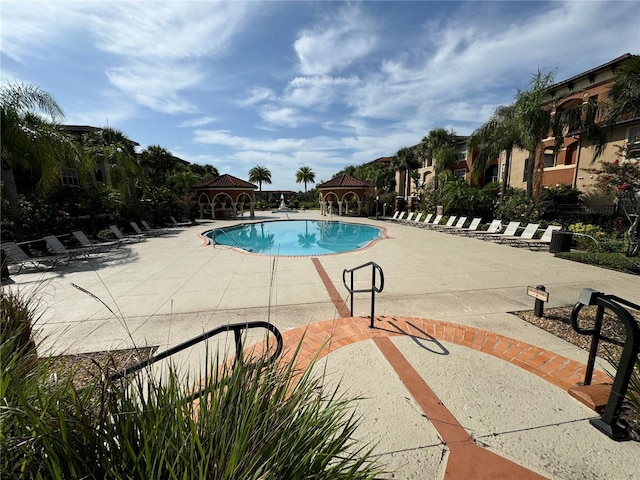 view of pool featuring a gazebo and a patio area