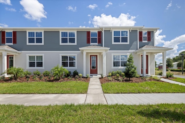 view of front of house with a front lawn